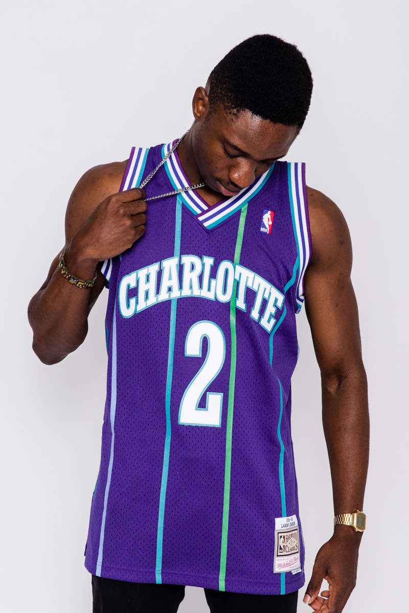 Larry Johnson Charlotte Hornets Unsigned Purple Alternate Jersey Jumpshot  Photograph