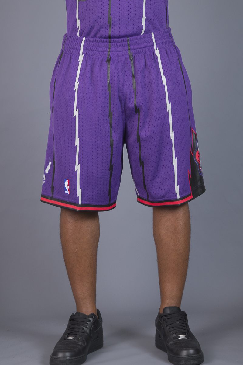 Shop Mitchell & Ness Toronto Raptors 1998-1999 Road Swingman Shorts  SMSHGS18255-TRAPURP98 purple
